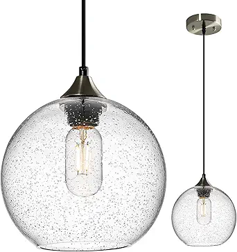 Two pendant lights are shown, one larger, close-up view and a smaller, more distant image. Both are a globe shape, made with speckled clear glass, and a single, visible bulb is inside.